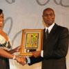 Ann-Dawn Young Sang, Chair AMCHAM Business & Civic Leadership Awards programme, presents the AMCHAM Award of Excellence, Civic Leadership – Individual to Kevin Wallen at the awards gala at the Jamaica Pegasus on September 28, 2010.  